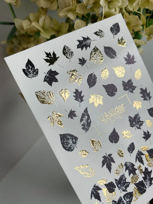 Sticker 710, schwarze und goldene Blätter